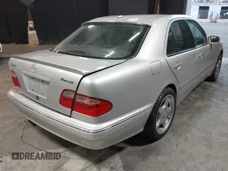2002 Mercedes-Benz E-Class with VIN WDBJF82J52X062526, listed as a IAAI auction lot 41192641 with 126,352 mi miles. Bid and sale history available at carsss.com. Image 4.