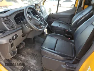 2021 Ford Transit Cargo with VIN 1FTBW9C87MKA79870, listed as a Copart auction lot 86796564 with 54,831 mi miles and Salvage Title. Bid and sale history available at DreamBid. Image 7.