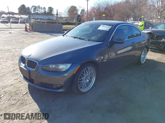 2008 BMW 3 Series 328i with VIN WBAWB335X8P134477, listed as a IAAI auction lot 41689616 with 187,974 mi miles. Bid and sale history available at carsss.com. Image 2.