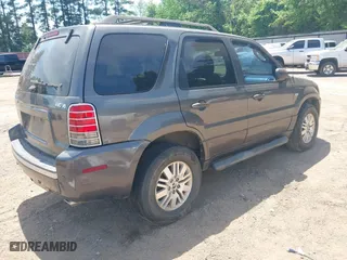 2005 Mercury Mariner Luxury with VIN 4M2CU57195DJ25103, listed as a IAAI auction lot 42032296 with 154,134 mi miles. Bid and sale history available at carsss.com. Image 4.