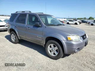 2007 Ford Escape Hybrid с VIN 1FMCU59H87KA16058, выставлен на аукционе Copart как лот 53134005 с пробегом 160 136 миль миль и Чистый • Clean title. История ставок и продаж доступна на DreamBid. Изображение 4.