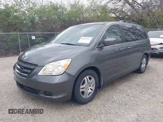 2007 Honda Odyssey EX-L with VIN 5FNRL38767B406636, listed as a IAAI auction lot 42032947 with 228,139 mi miles and . Bid and sale history available at carsss.com. Image 2.