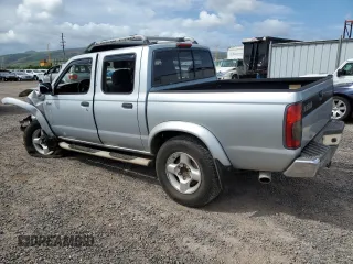 2000 Nissan Frontier XE with VIN 1N6ED27T8YC367452, listed as a Copart auction lot 55866345 with 242,945 mi miles and Salvage title. Bid and sale history available at DreamBid. Image 2.