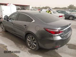 2020 Mazda 6 Signature with VIN JM1GL1XY6L1522900, listed as a IAAI auction lot 41724818 with 62,846 mi miles and . Bid and sale history available at DreamBid. Image 3.