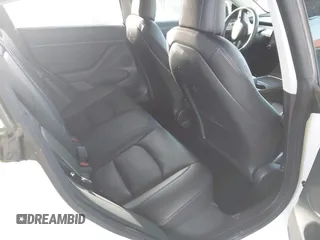 2022 Tesla Model 3 Long Range with VIN 5YJ3E1EB1NF236969, listed as a IAAI auction lot 41525117 with 24,215 mi miles and . Bid and sale history available at DreamBid. Image 8.
