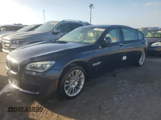 2015 BMW 7 Series 750Li xDrive with VIN WBAYF8C58FD654184, listed as a Copart auction lot 77203184 with 122,955 mi miles and Non Repairable. Bid and sale history available at DreamBid. Image 1.