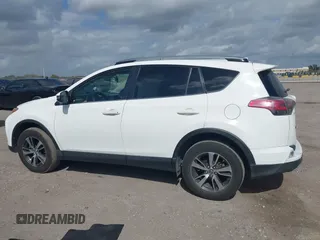 2018 Toyota RAV4 XLE with VIN JTMWFREV7JJ731893, listed as a IAAI auction lot 41567850 with 141,269 mi miles. Bid and sale history available at carsss.com. Image 14.