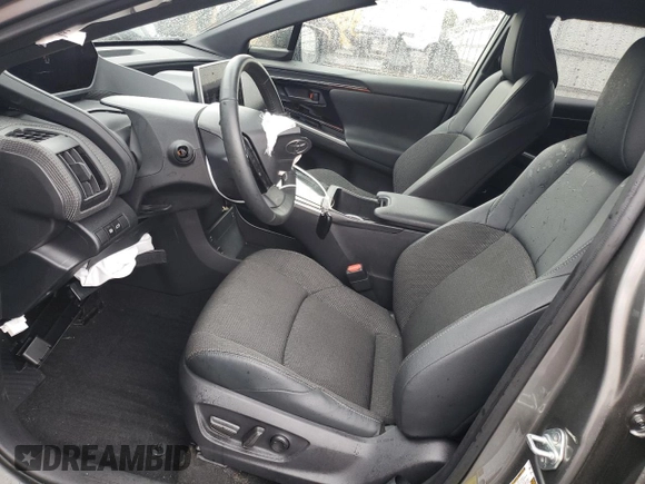 2024 Toyota bZ4X XLE with VIN JTMABACA3RA079406, listed as a Copart auction lot 56758445 with 3,483 mi miles and Salvage title. Bid and sale history available at DreamBid. Image 7.