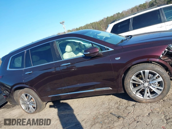 2021 Cadillac XT6 Premium Luxury with VIN 1GYKPDRS7MZ133561, listed as a IAAI auction lot 41112365 with 73,956 mi miles. Bid and sale history available at carsss.com. Image 13.