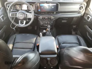 2024 Jeep Wrangler Sahara with VIN 1C4PJXEN1RW118397, listed as a Copart auction lot 56307925 with 7,257 mi miles and Salvage Title. Bid and sale history available at DreamBid. Image 8.