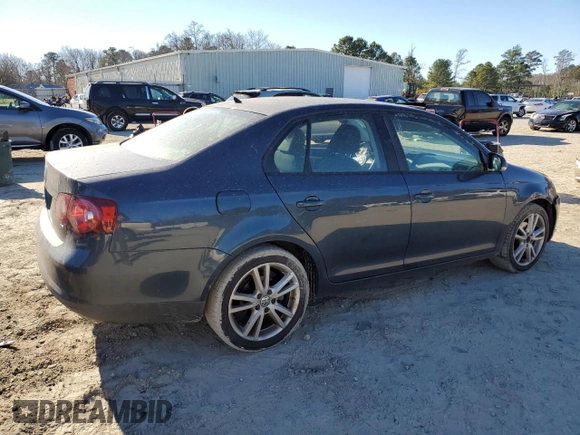 2010 Volkswagen Jetta S with VIN 3VWJX7AJ8AM007693, listed as a Copart auction lot 86056024 with 198,492 mi miles and Salvage title. Bid and sale history available at DreamBid. Image 3.