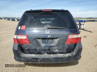 2006 Honda Odyssey EX-L z VIN 5FNRL38706B128265, wystawiony jako Copart lot #58715415 z przebiegiem 377 656 mil mil oraz Szkoda całkowita • Salvage title. Historia ofert i sprzedaży dostępna na DreamBid. Obrazek 6.