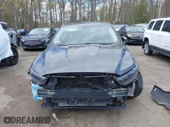 2015 Ford Fusion Titanium with VIN 3FA6P0K96FR283763, listed as a IAAI auction lot 42046868 with 104,542 mi miles. Bid and sale history available at carsss.com. Image 13.