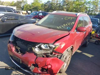 2016 Nissan Rogue SV with VIN 5N1AT2MVXGC872851, listed as a IAAI auction lot 42142351 with 117,251 mi miles and . Bid and sale history available at DreamBid. Image 2.