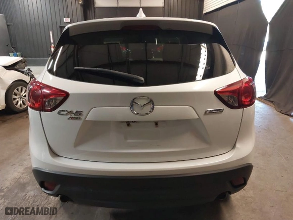 2015 Mazda CX-5 Touring with VIN JM3KE4CY4F0509530, listed as a IAAI auction lot 41858134 with 102,360 mi miles. Bid and sale history available at carsss.com. Image 16.