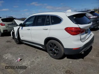 2018 BMW X1 xDrive28i with VIN WBXHT3C30J5F92074, listed as a Copart auction lot 51069535 with 116,381 mi miles and Salvage Title. Bid and sale history available at carsss.com. Image 2.