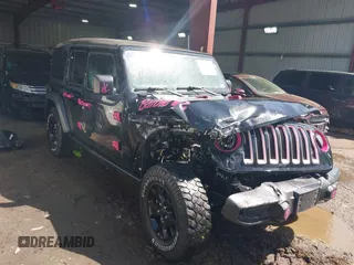 2021 Jeep Wrangler Unlimited Sport S with VIN 1C4HJXDG7MW714968, listed as a IAAI auction lot 41983752 with 50,980 mi miles. Bid and sale history available at carsss.com. Image 1.