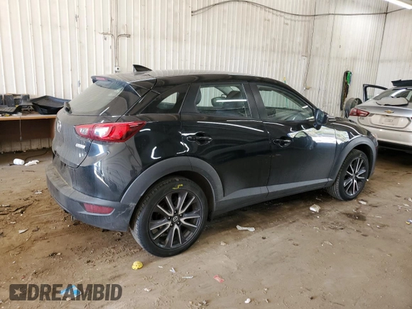 2018 Mazda CX-3 Touring with VIN JM1DKFC70J0316975, listed as a Copart auction lot 48657905 with 76,240 mi miles and Salvage Title. Bid and sale history available at carsss.com. Image 3.