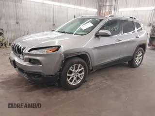 2014 Jeep Cherokee Altitude with VIN 1C4PJMCB9EW149754, listed as a IAAI auction lot 41983427 with 199,810 mi miles and . Bid and sale history available at DreamBid. Image 18.