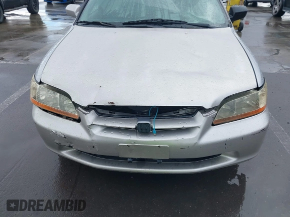 1999 Honda Accord LX z VIN 1HGCG5645XA023392, wystawiony jako IAAI lot #41525751 z przebiegiem 214 850 mil mil oraz . Historia ofert i sprzedaży dostępna na DreamBid. Obrazek 6.