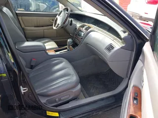2004 Toyota Avalon XL with VIN 4T1BF28BX4U365790, listed as a IAAI auction lot 41768021 with 231,129 mi miles and . Bid and sale history available at carsss.com. Image 5.
