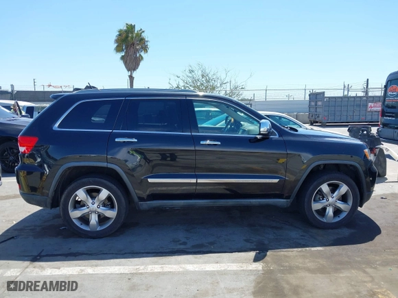 2012 Jeep Grand Cherokee Overland with VIN 1C4RJFCT7CC185602, listed as a IAAI auction lot 42018715 with 91,507 mi miles. Bid and sale history available at carsss.com. Image 13.
