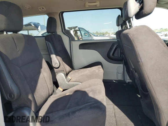 2014 Dodge Grand Caravan SXT z VIN 2C4RDGCG6ER223900, wystawiony jako Copart lot #56960965 z przebiegiem 101 275 mil mil oraz Szkoda całkowita • Salvage title. Historia ofert i sprzedaży dostępna na DreamBid. Obrazek 11.