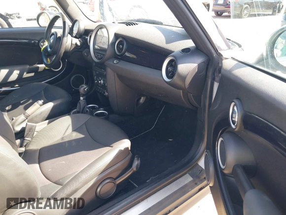 2011 MINI Convertible with VIN WMWZN3C57BT133094, listed as a IAAI auction lot 41711094 with 96,056 mi miles and . Bid and sale history available at DreamBid. Image 5.