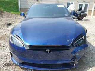 2022 Tesla Model S with VIN 5YJSA1E55NF486443, listed as a IAAI auction lot 42720110 with Not provided miles and . Bid and sale history available at DreamBid. Image 13.