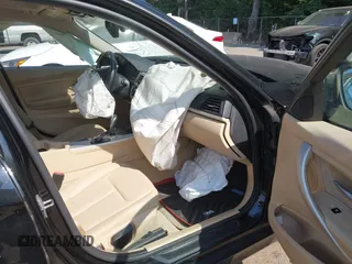 2014 BMW 3 Series 320i xDrive with VIN WBA3C3C56EK200175, listed as a IAAI auction lot 42617731 with 96,596 mi miles and . Bid and sale history available at DreamBid. Image 5.