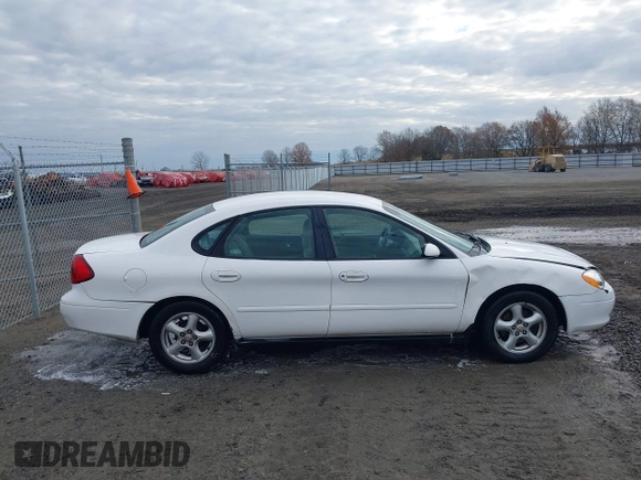 2002 Ford Taurus SES Standard with VIN 1FAFP55U12A184513, listed as a IAAI auction lot 41125306 with 241,896 mi miles. Bid and sale history available at carsss.com. Image 13.