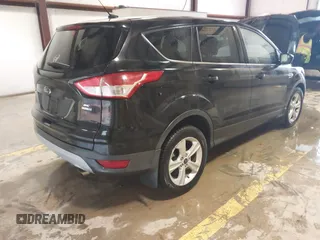 2014 Ford Escape SE z VIN 1FMCU9GX6EUB69007, wystawiony jako IAAI lot #41710065 z przebiegiem 113 080 mil mil oraz . Historia ofert i sprzedaży dostępna na DreamBid. Obrazek 4.