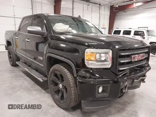 2015 GMC Sierra 1500 SLT with VIN 3GTU2VEJ1FG239555, listed as a IAAI auction lot 40785887 with 154,129 mi miles and . Bid and sale history available at DreamBid. Image 1.
