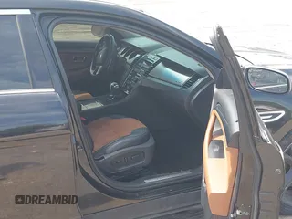 2012 Ford Taurus SHO z VIN 1FAHP2KT6CG143490, wystawiony jako IAAI lot #42235776 z przebiegiem 125 671 mil mil oraz . Historia ofert i sprzedaży dostępna na DreamBid. Obrazek 5.