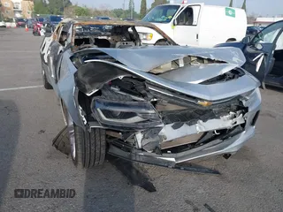 2018 Chevrolet Camaro 1LT z VIN 1G1FB1RS7J0127238, wystawiony jako IAAI lot #41634091 z przebiegiem Nie podano mil oraz . Historia ofert i sprzedaży dostępna na DreamBid. Obrazek 1.