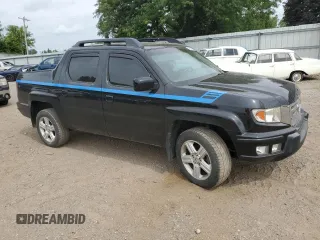 2010 Honda Ridgeline RTL with VIN 5FPYK1F5XAB014004, listed as a Copart auction lot 62848595 with 131,920 mi miles and Clean title. Bid and sale history available at DreamBid. Image 4.