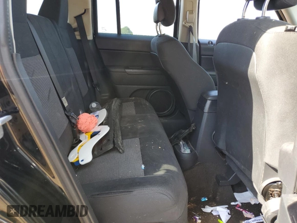 2014 Jeep Patriot Sport z VIN 1C4NJPBAXED545771, wystawiony jako Copart lot #53090775 z przebiegiem 128 427 mil mil oraz Szkoda całkowita • Salvage title. Historia ofert i sprzedaży dostępna na DreamBid. Obrazek 10.