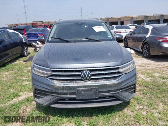 2023 Volkswagen Tiguan SE with VIN 3VVNB7AX2PM064599, listed as a IAAI auction lot 41923005 with Not provided miles and . Bid and sale history available at DreamBid. Image 12.