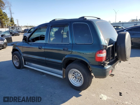 2001 Kia Sportage with VIN KNDJB723115705926, listed as a Copart auction lot 41489735 with 155,820 mi miles and Salvage Title. Bid and sale history available at carsss.com. Image 2.