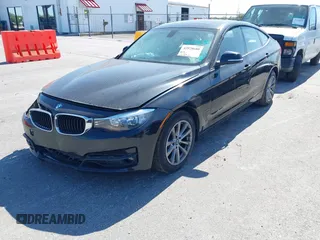 2014 BMW 3 Series GT 328i xDrive with VIN WBA3X5C51ED557347, listed as a IAAI auction lot 42028680 with 178,469 mi miles. Bid and sale history available at carsss.com. Image 2.