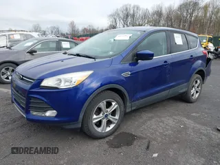2015 Ford Escape SE with VIN 1FMCU9GX4FUC73125, listed as a IAAI auction lot 42071815 with 71,681 mi miles. Bid and sale history available at carsss.com. Image 17.