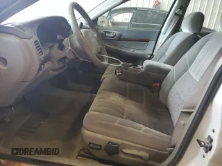 2003 Chevrolet Impala z VIN 2G1WF52EX39441944, wystawiony jako Copart lot #59876805 z przebiegiem 212 313 mil mil oraz Nie do naprawy • Non repairable. Historia ofert i sprzedaży dostępna na DreamBid. Obrazek 7.