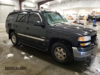 2004 GMC Yukon SLE with VIN 1GKEK13Z44J123899, listed as a Copart auction lot 86372974 with 201,093 mi miles and Salvage Title. Bid and sale history available at carsss.com. Image 4.