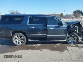 2019 Cadillac Escalade ESV Luxury z VIN 1GYS4HKJ0KR217932, wystawiony jako IAAI lot #41446166 z przebiegiem 86 404 mil mil oraz . Historia ofert i sprzedaży dostępna na DreamBid. Obrazek 13.