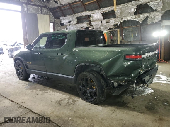 2023 Rivian R1T Adventure with VIN 7FCTGAAA0PN024165, listed as a Copart auction lot 84265444 with Not Provided miles and Salvage Title. Bid and sale history available at carsss.com. Image 2.