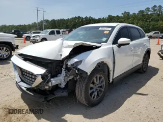 2020 Mazda CX-9 Touring с VIN JM3TCACY2L0421483, выставлен на аукционе Copart как лот 55812315 с пробегом 89 897 миль миль и Списание • Salvage title. История ставок и продаж доступна на DreamBid. Изображение 1.