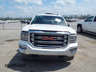 2018 GMC Sierra 1500 SLT z VIN 3GTU2NEC9JG240754, wystawiony jako IAAI lot #41890229 z przebiegiem 183 966 mil mil oraz . Historia ofert i sprzedaży dostępna na DreamBid. Obrazek 12.
