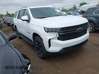2022 Chevrolet Suburban RST with VIN 1GNSKEKT2NR320986, listed as a IAAI auction lot 42365148 with 59,159 mi miles and . Bid and sale history available at DreamBid. Image 1.