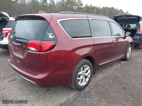 2017 Chrysler Pacifica Touring-L with VIN 2C4RC1BG8HR588293, listed as a IAAI auction lot 41704160 with 99,054 mi miles. Bid and sale history available at carsss.com. Image 4.