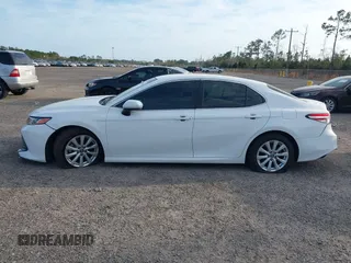2019 Toyota Camry LE with VIN 4T1B11HK7KU806197, listed as a IAAI auction lot 41721148 with 83,373 mi miles and . Bid and sale history available at DreamBid. Image 14.
